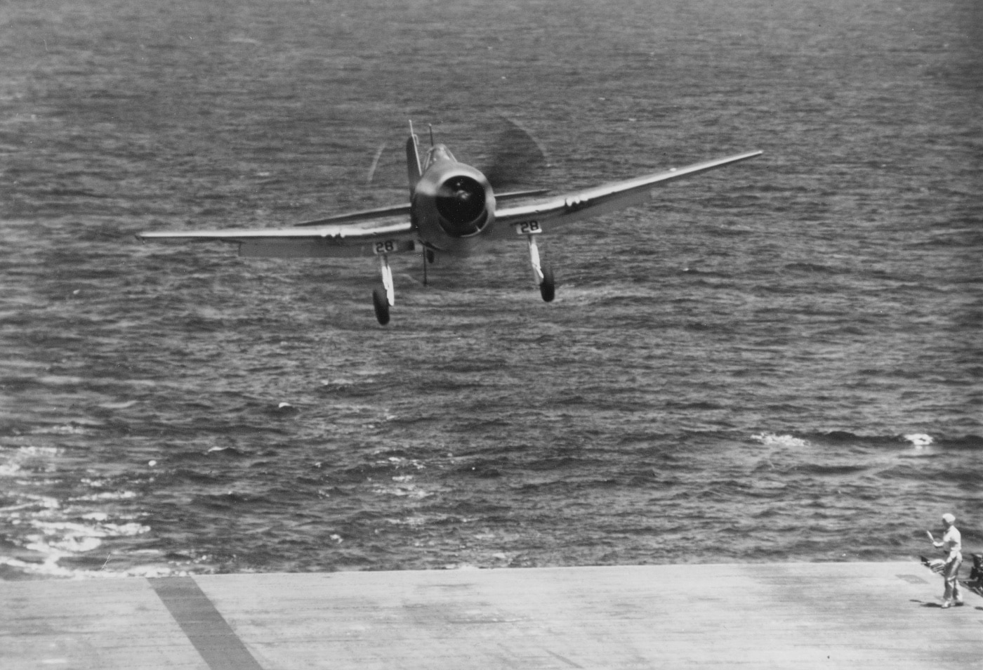 Hellcat landing on an aircraft carrier